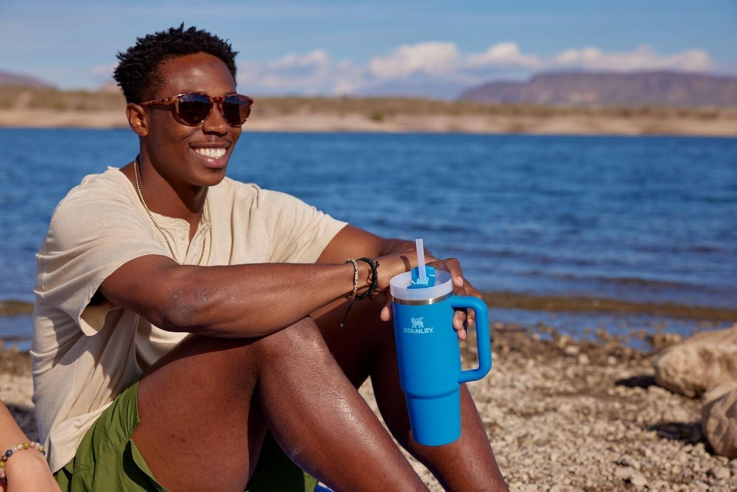 imageSTANLEY Quencher H20 Tumbler with Handle and Straw 30 oz Flowstate 3Position Lid Cup Holder Compatible for Travel Insulated Stainless Steel Cup BPAFree Exclusive Toasted AlmondAzure