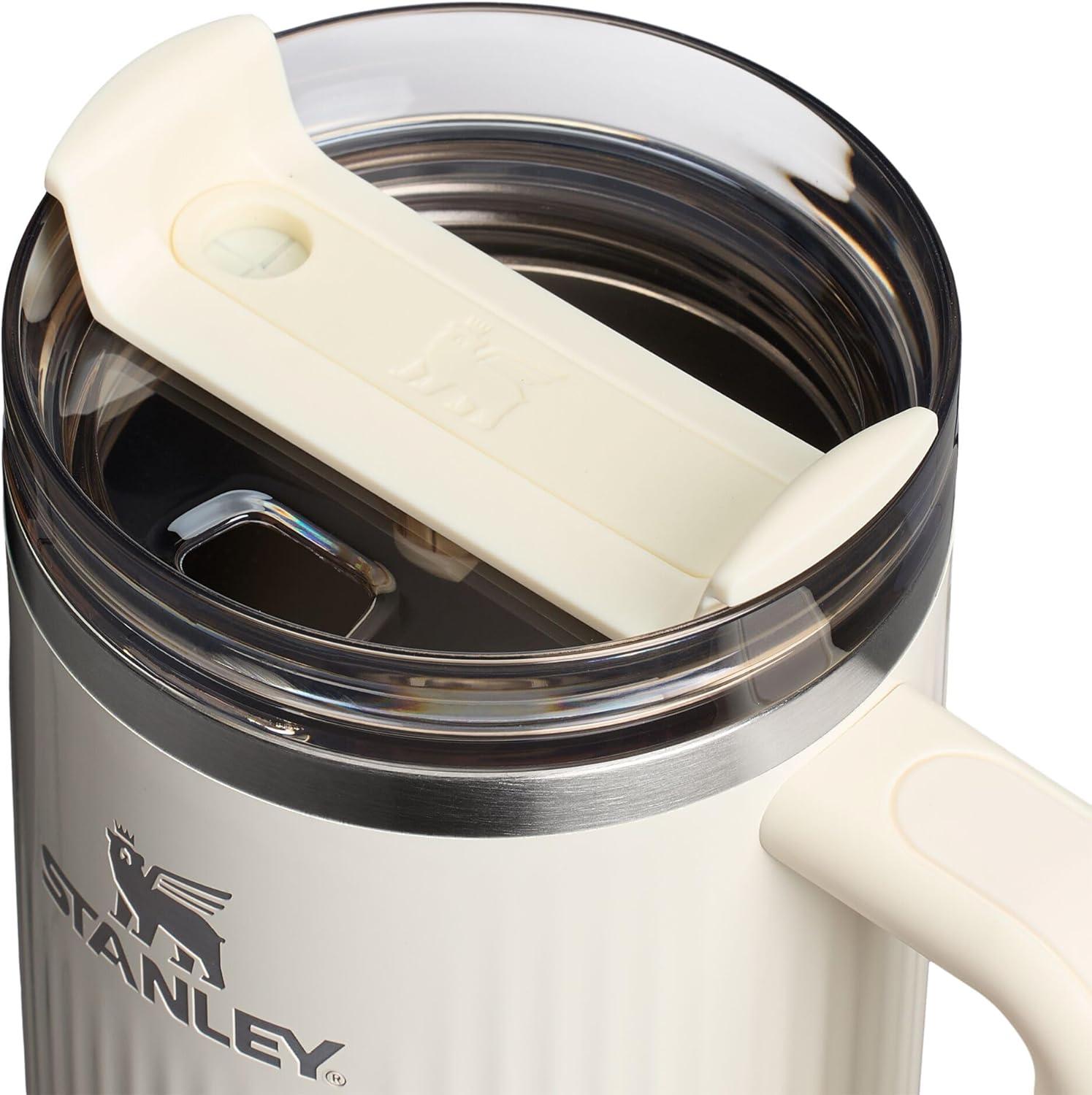 imageSTANLEY Quencher H20 Tumbler with Handle and Straw 30 oz Flowstate 3Position Lid Cup Holder Compatible for Travel Insulated Stainless Steel Cup BPAFree Exclusive Toasted AlmondFluted Cream Gloss