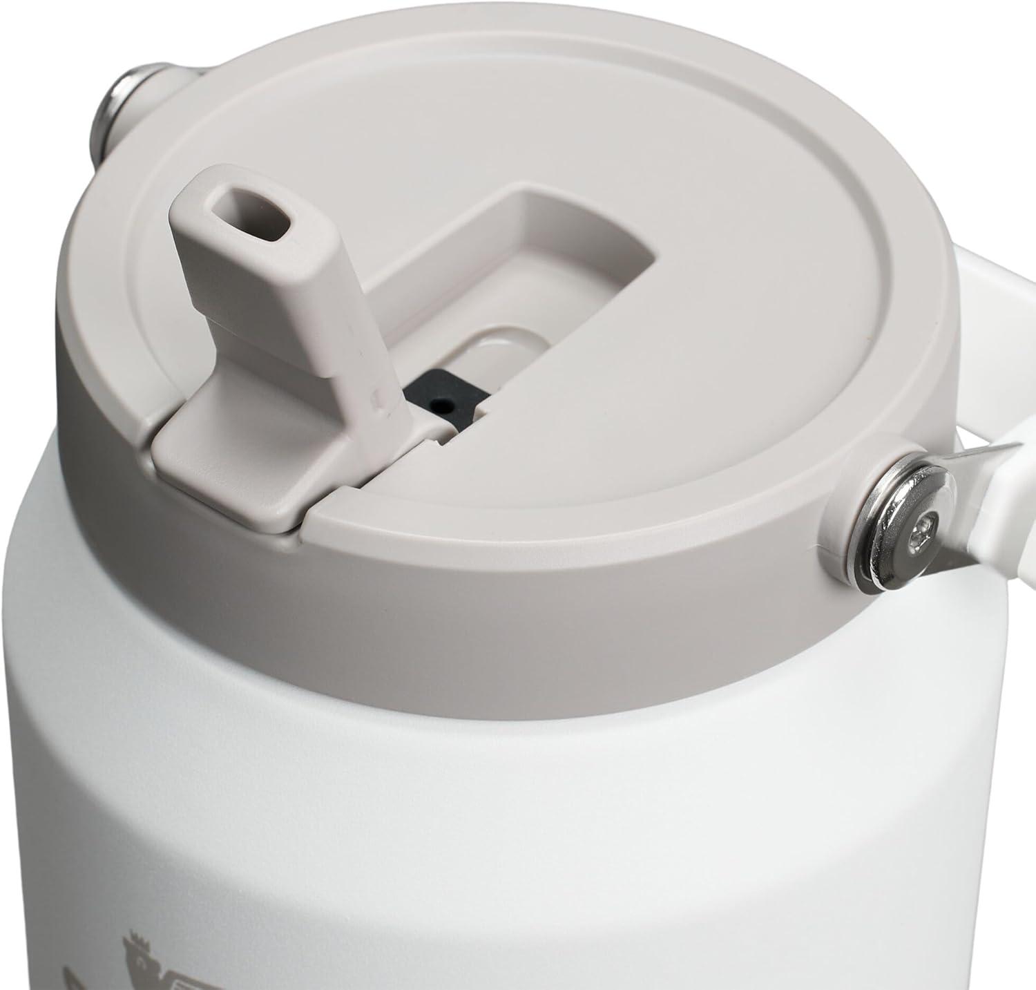 imageSTANLEY IceFlow 20 Flip Straw Jug with Handle 40 oz Twist On Lid and Flip Up Straw Leakproof for Travel and Sports Insulated Stainless Steel BPAFree Black 20Frost