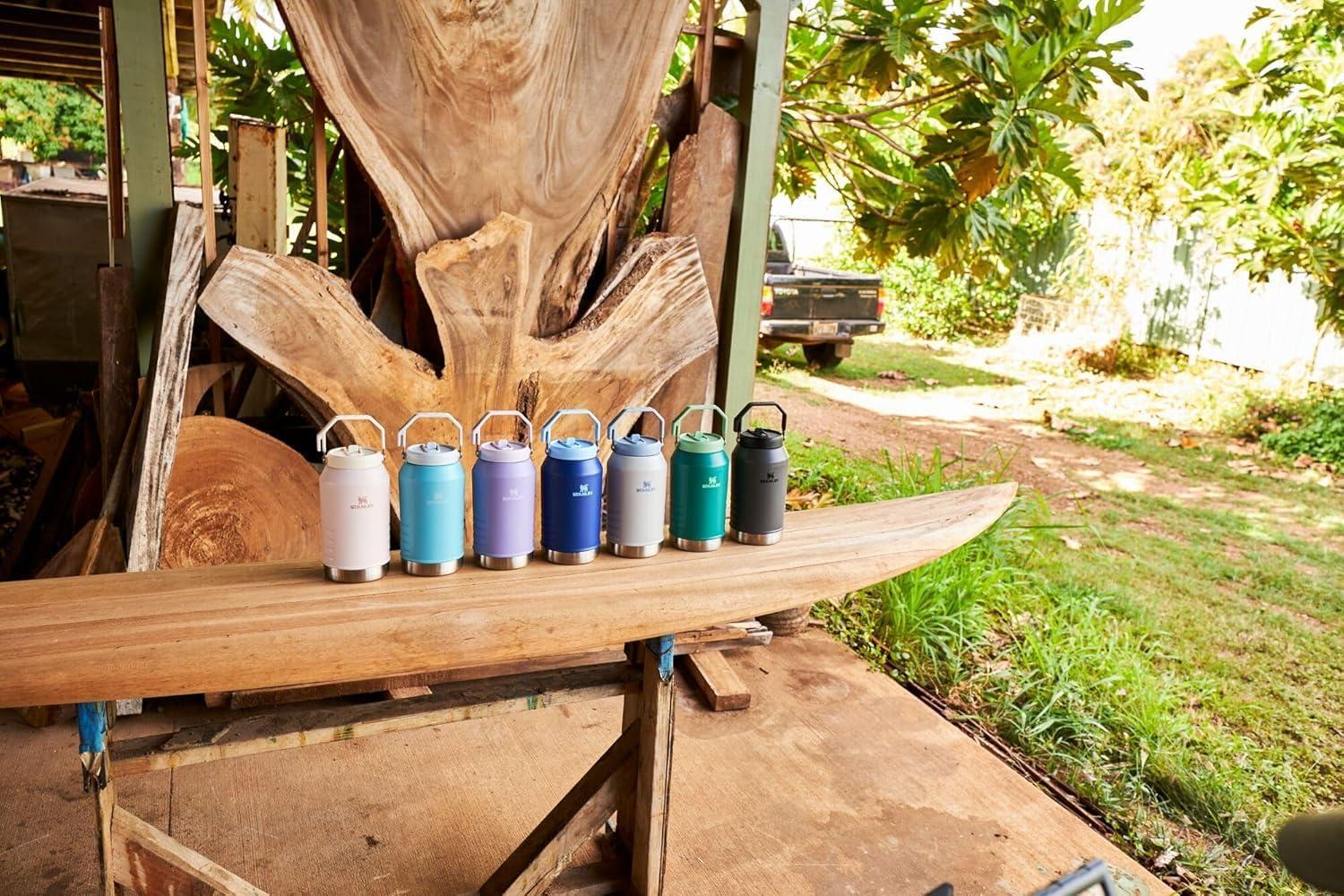 imageSTANLEY IceFlow 20 Flip Straw Jug with Handle 40 oz Twist On Lid and Flip Up Straw Leakproof for Travel and Sports Insulated Stainless Steel BPAFree Black 20Pool