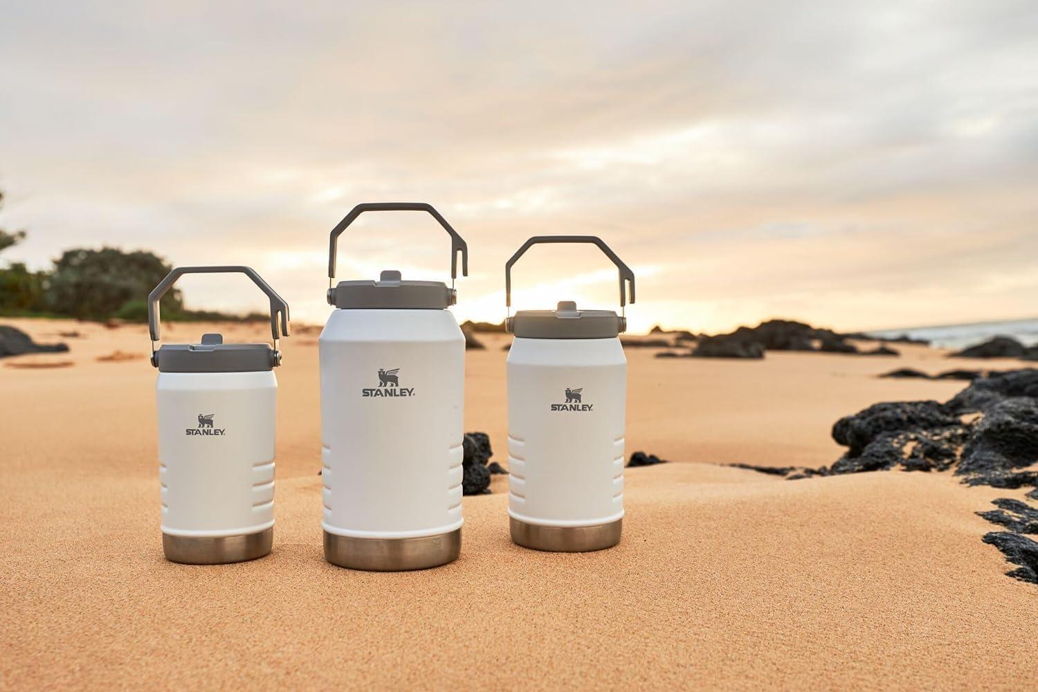 imageSTANLEY IceFlow 20 Flip Straw Jug with Handle 40 oz Twist On Lid and Flip Up Straw Leakproof for Travel and Sports Insulated Stainless Steel BPAFree Black 20Charcoal