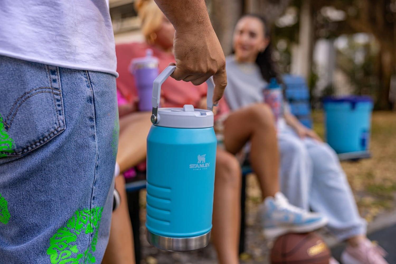 imageSTANLEY IceFlow 20 Flip Straw Jug with Handle 40 oz Twist On Lid and Flip Up Straw Leakproof for Travel and Sports Insulated Stainless Steel BPAFree Black 20Pool