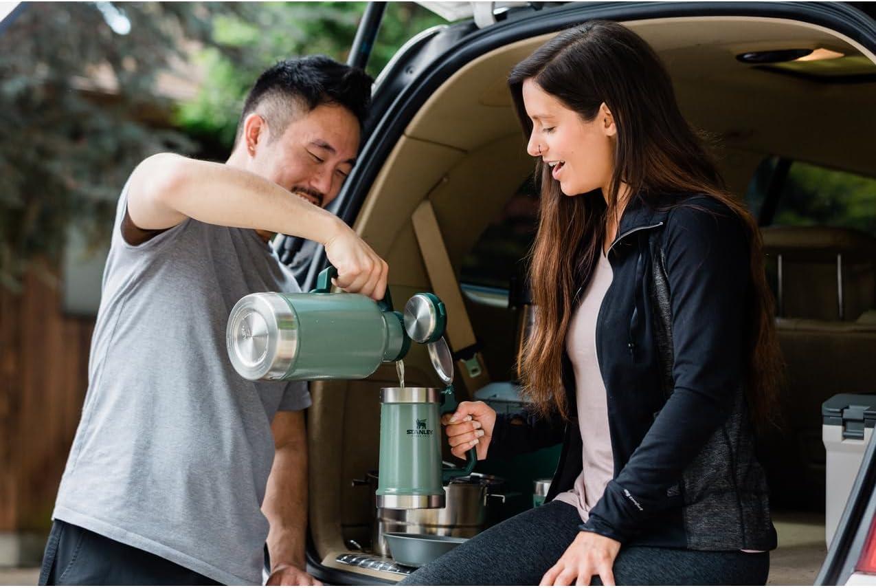 imageSTANLEY Classic Bottle Opener Beer Stein 24 oz Flip Up Lid and Heavy Duty Handle with Built In Bottle Opener Insulated Stainless Steel Beer Mug BPAFree Hammertone GreenHammertone Green
