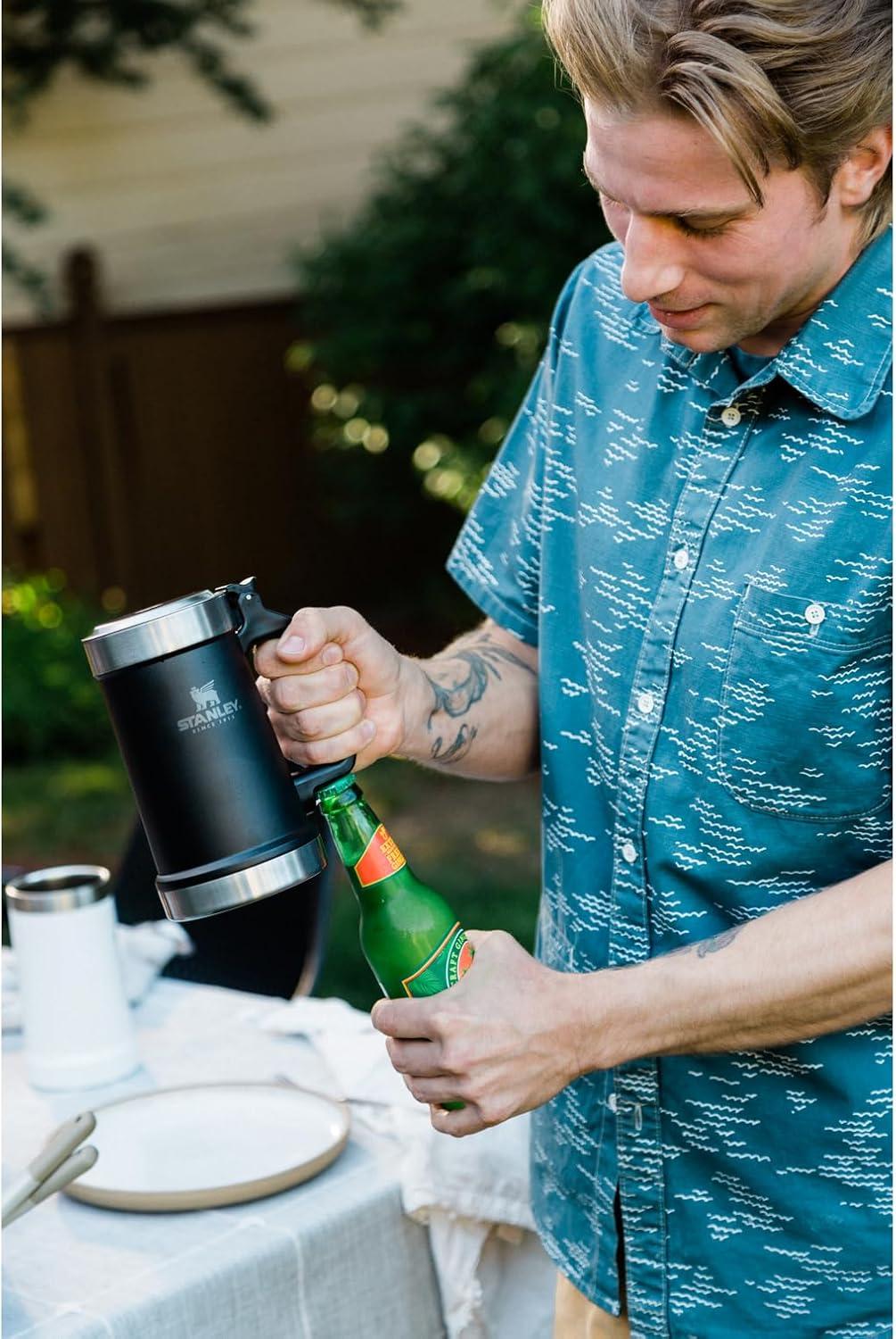 imageSTANLEY Classic Bottle Opener Beer Stein 24 oz Flip Up Lid and Heavy Duty Handle with Built In Bottle Opener Insulated Stainless Steel Beer Mug BPAFree Hammertone GreenHammertone Green