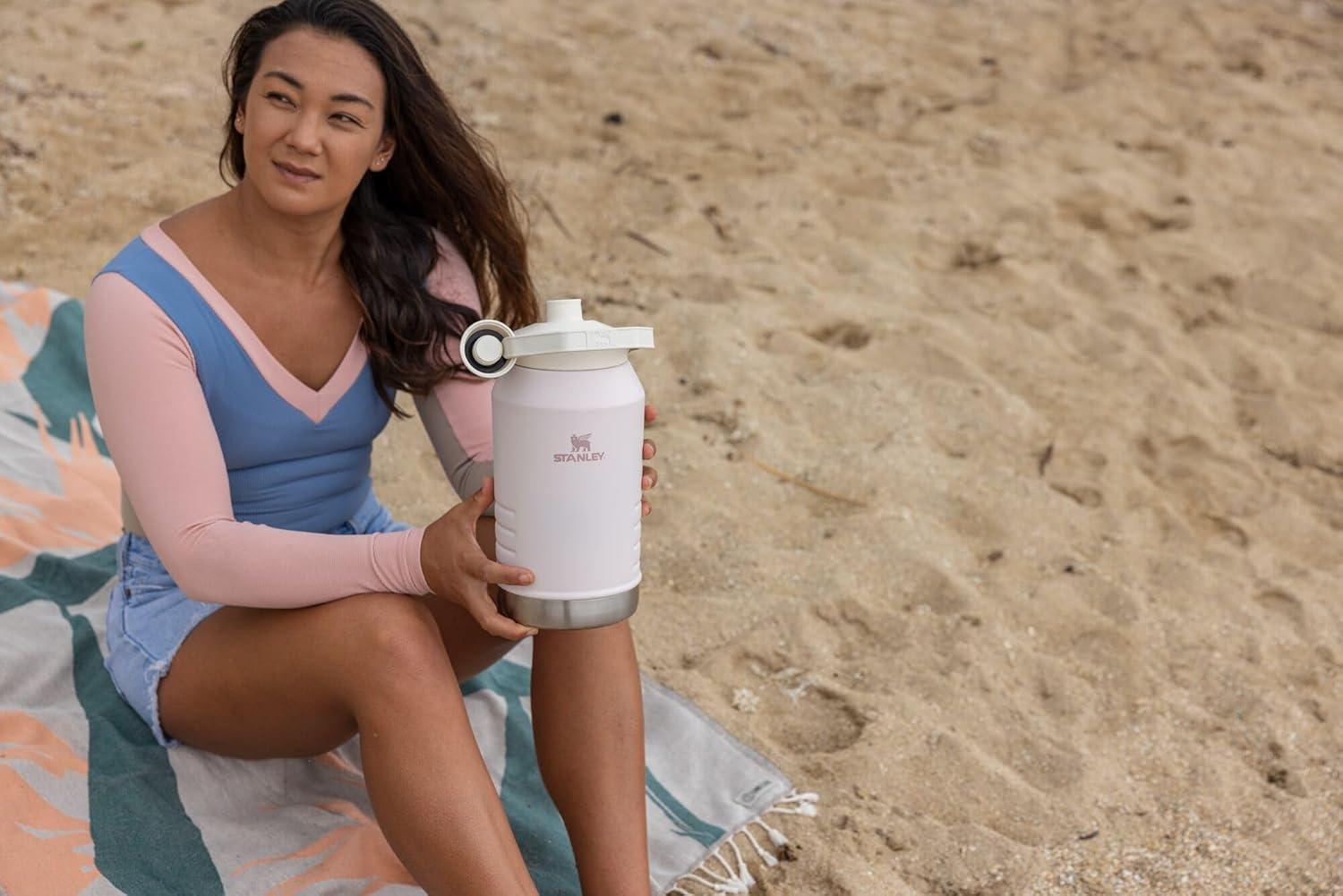 imageStanley IceFlow Fast Flow Jug with Handle 64 oz Twist On Angled Spout Lid Leakproof for Travel and Sports Insulated Stainless Steel BPAFree BlackRose Quartz