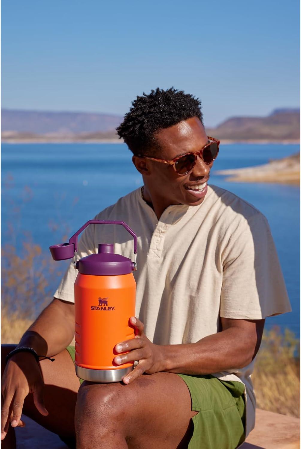 imageStanley IceFlow Fast Flow Jug with Handle 64 oz Twist On Angled Spout Lid Leakproof for Travel and Sports Insulated Stainless Steel BPAFree BlackRose Quartz