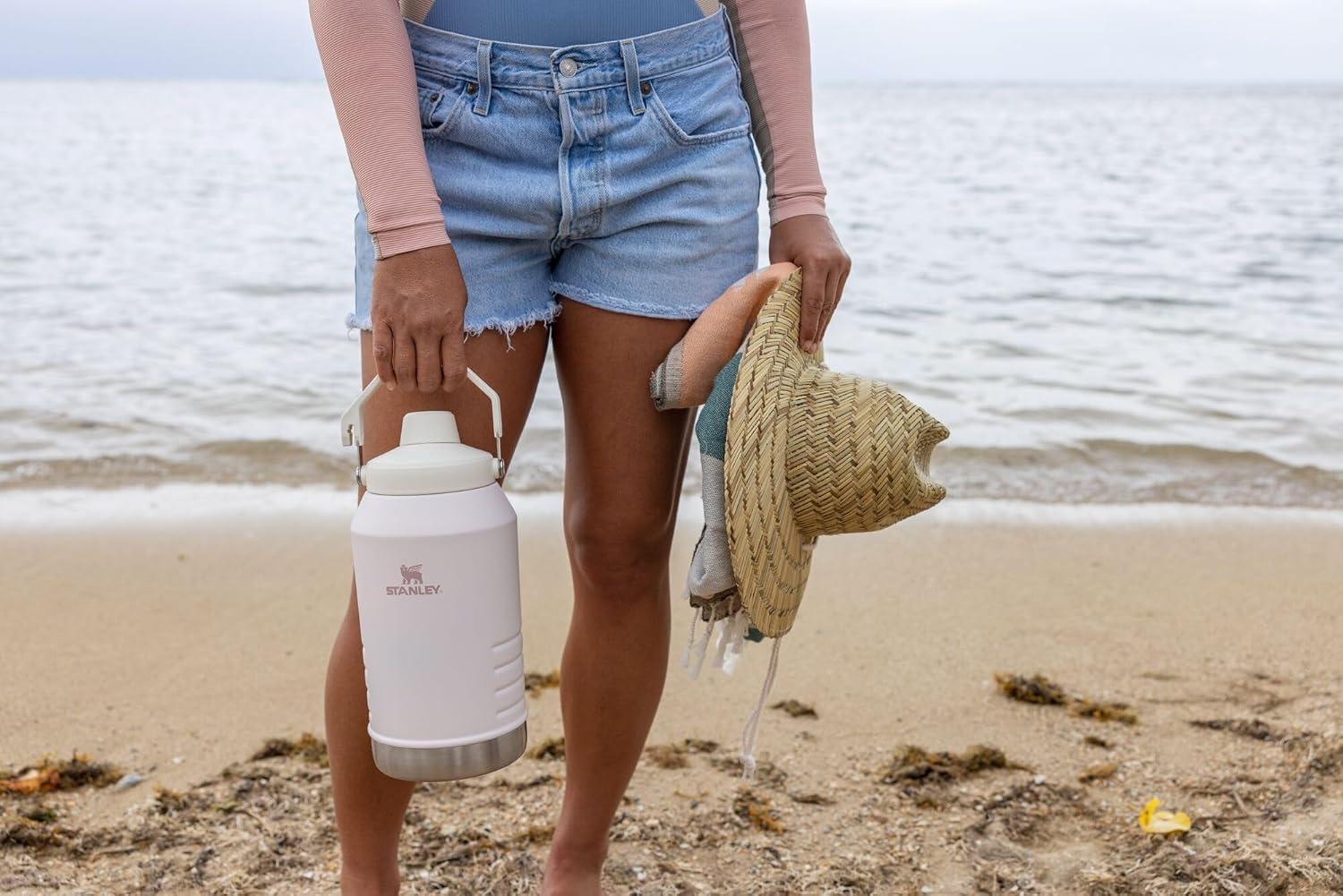 imageStanley IceFlow Fast Flow Jug with Handle 64 oz Twist On Angled Spout Lid Leakproof for Travel and Sports Insulated Stainless Steel BPAFree BlackRose Quartz