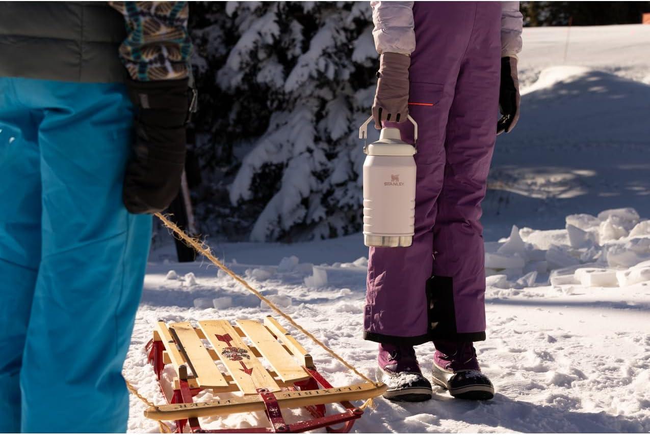 imageStanley IceFlow Fast Flow Jug with Handle 64 oz Twist On Angled Spout Lid Leakproof for Travel and Sports Insulated Stainless Steel BPAFree BlackLavender