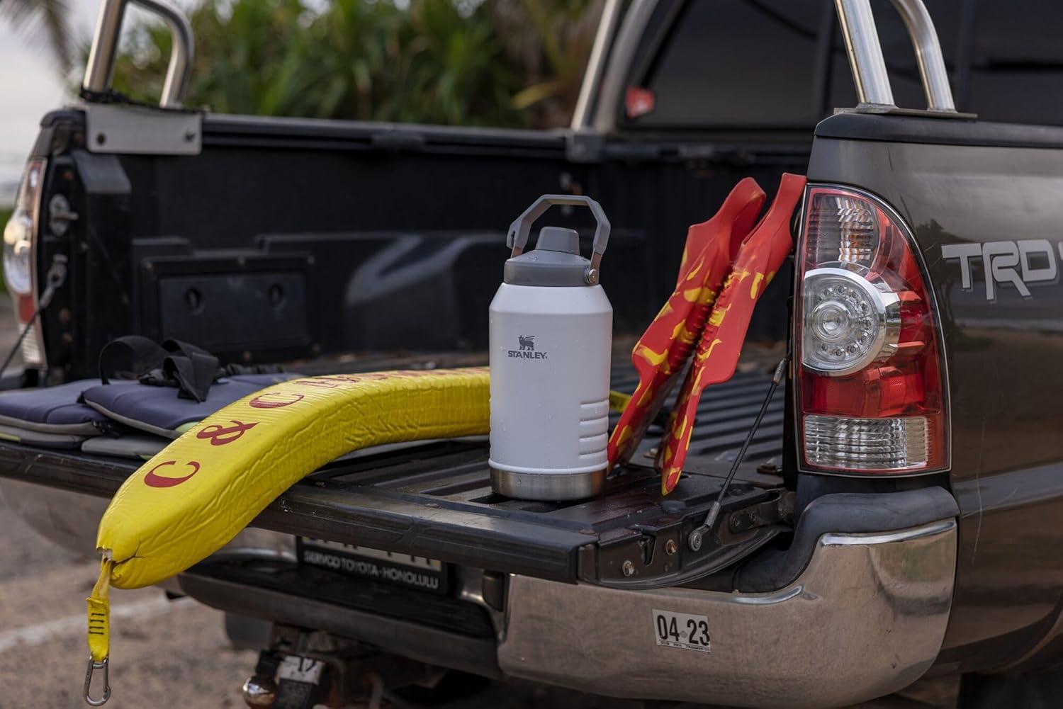 imageStanley IceFlow Fast Flow Jug with Handle 64 oz Twist On Angled Spout Lid Leakproof for Travel and Sports Insulated Stainless Steel BPAFree BlackPolar