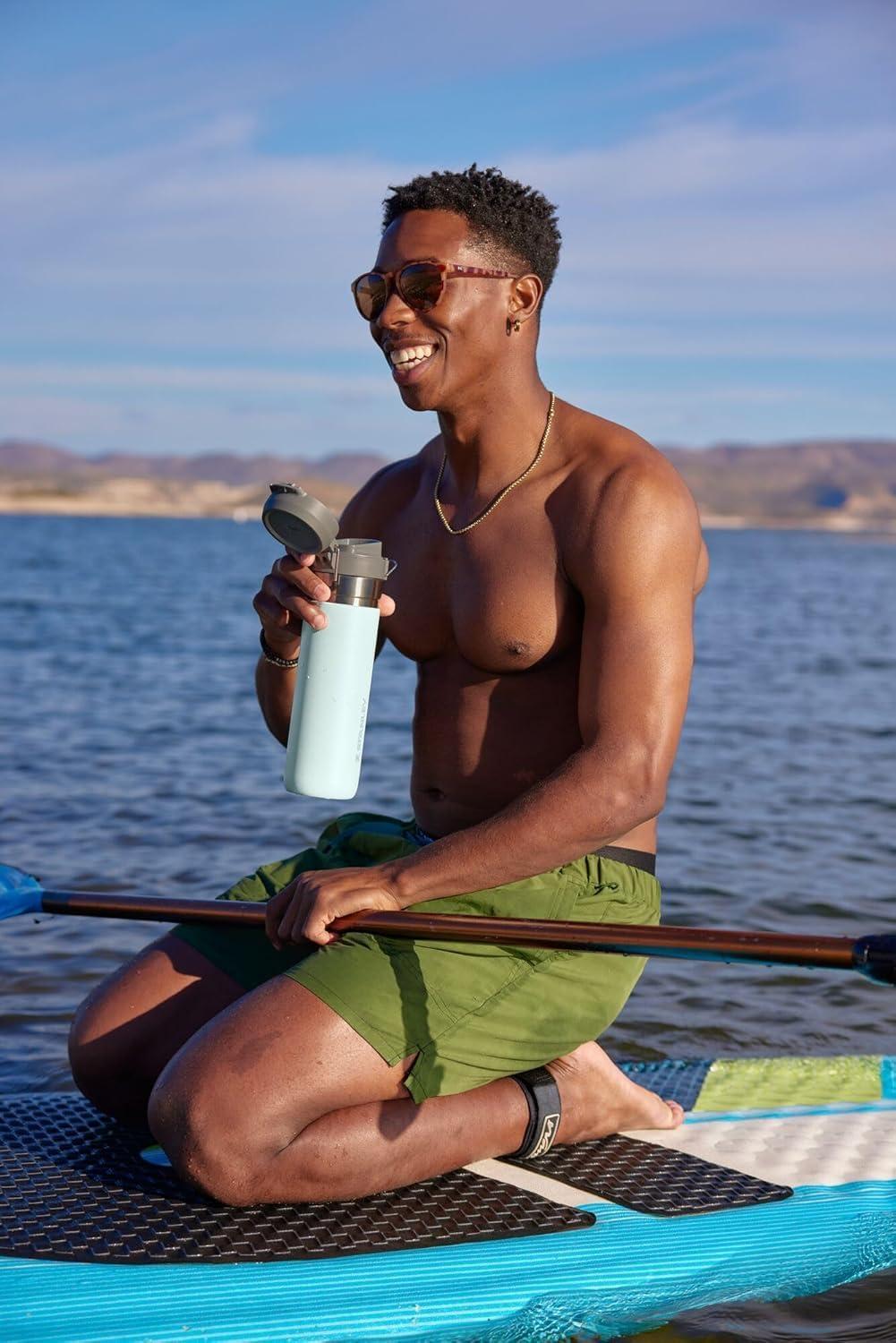 imageStanley Quick Flip GO Water Bottle 24 oz Push Button Lid Leakproof and Packable for Travel and Sports Insulated Stainless Steel BPAFree Mist24 Ounces Pack of 4