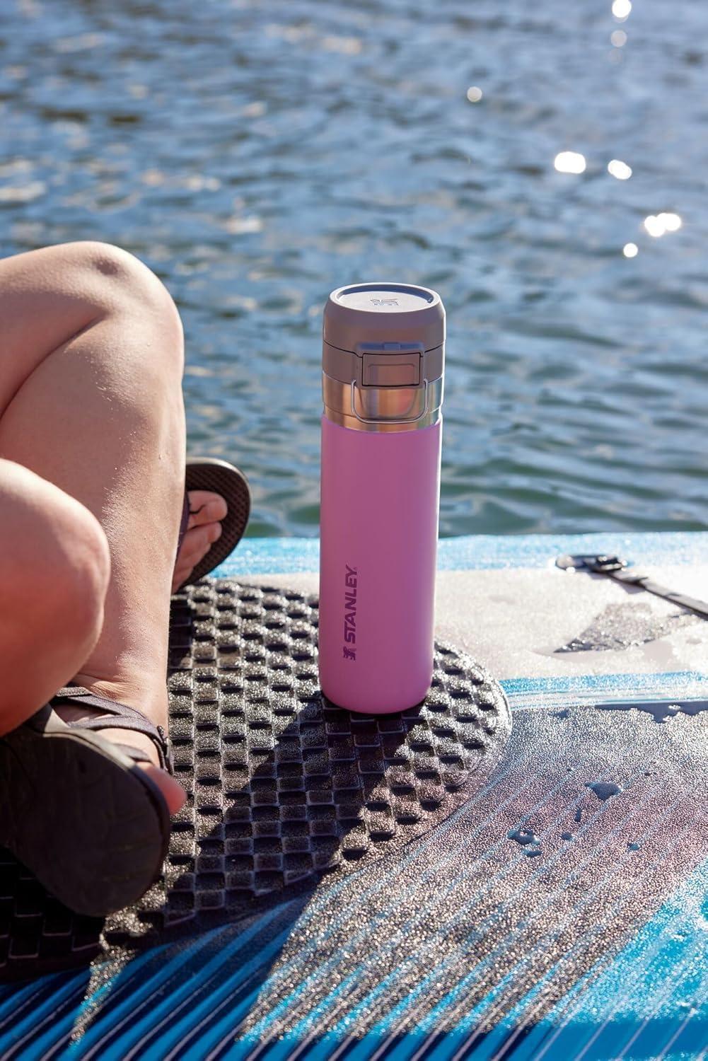 imageStanley Quick Flip GO Water Bottle 24 oz Push Button Lid Leakproof and Packable for Travel and Sports Insulated Stainless Steel BPAFree Mist24 Ounces Pack of 4