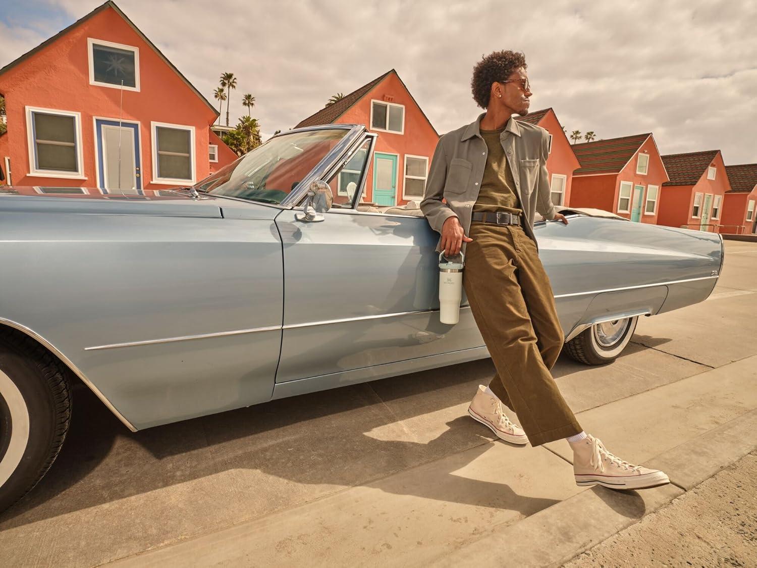 imageStanley IceFlow Flip Straw Tumbler with Handle 20 oz Twist On Lid and Flip Up Straw Leak Resistant Water Bottle Insulated Stainless Steel BPAFree CharcoalDaffodil